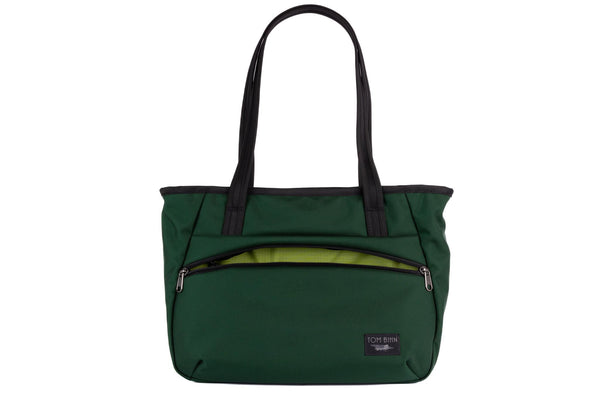 Photo of the Nomad Tote in Wilderness Ballistic with Moss (green with dark green grid) 210 Cerylon interior.
